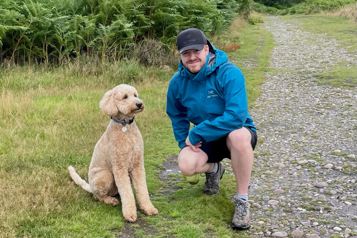 Ashley with his dog Teddy